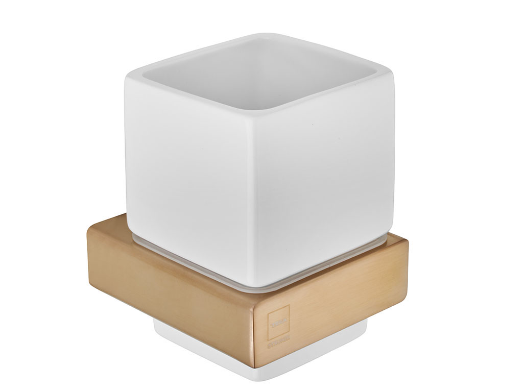 Wall mounted tumbler holder